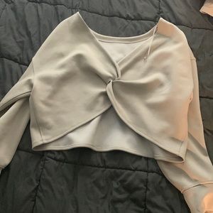 Twist back to front sweater